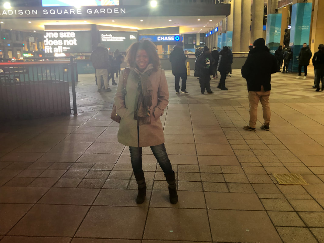Jennifer D. Laws is in front of Madison Square Garden for the Knicks vs Raptors game on February 9, 2019