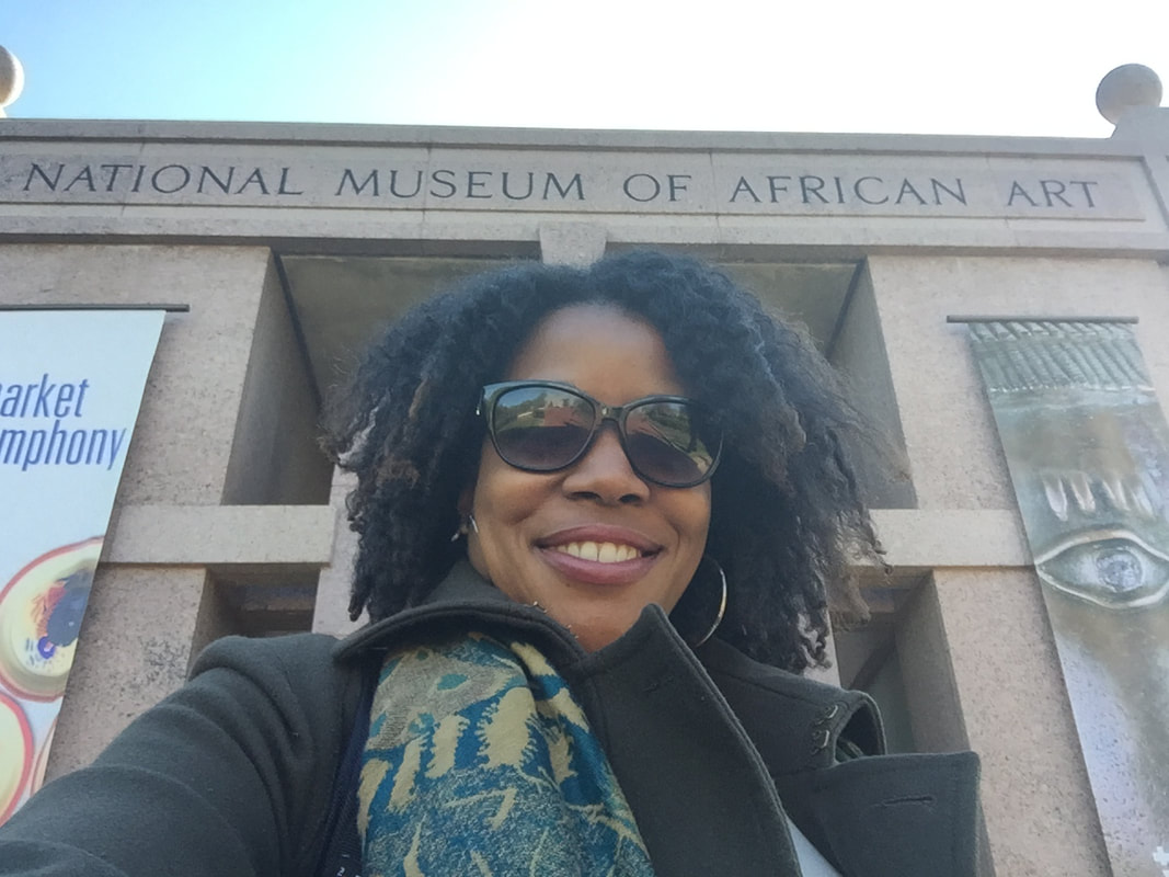 Jennifer D. Laws stands in front of the National Museum of African Art - Smithsonian in April 2016.