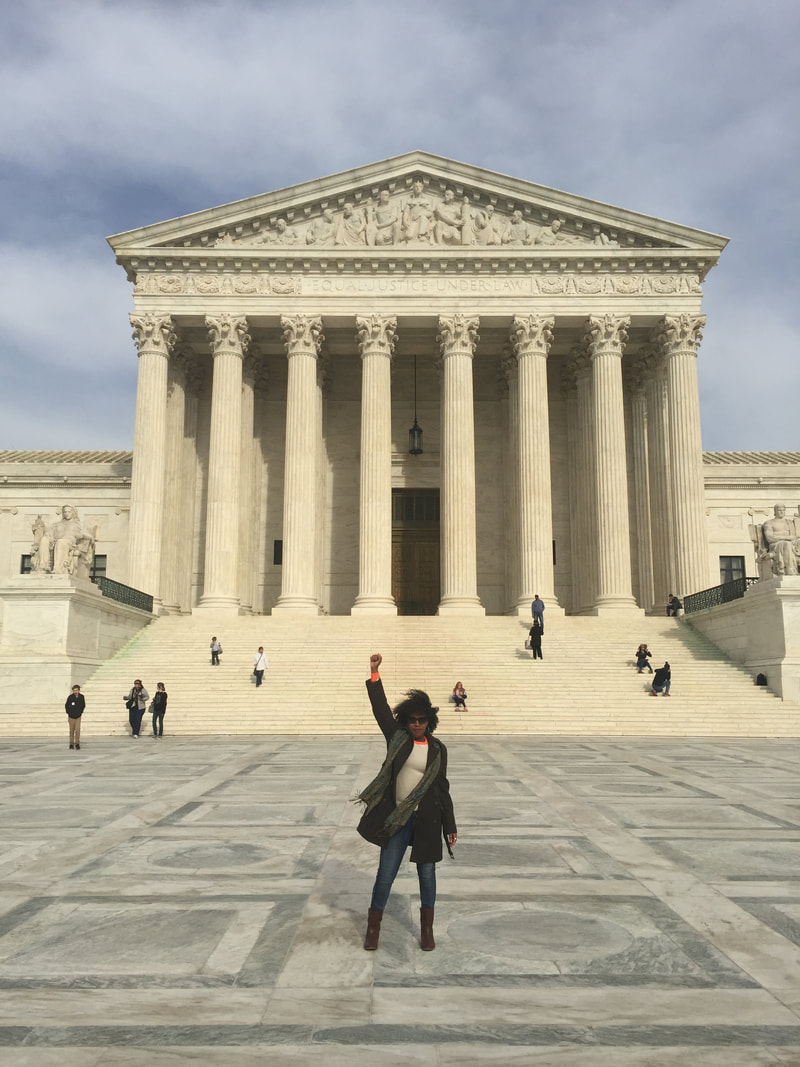 Jennifer D. Laws stands in front of the Supreme Court of the United States in April 2016.