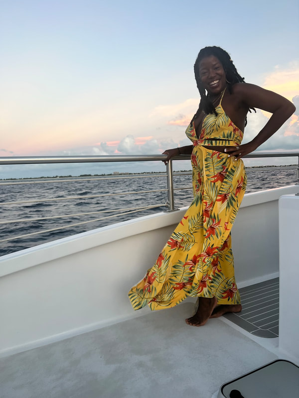 Jennifer D. Laws celebrates her 39th birthday aboard the Ritz Carlton Lady Grace Catamaran