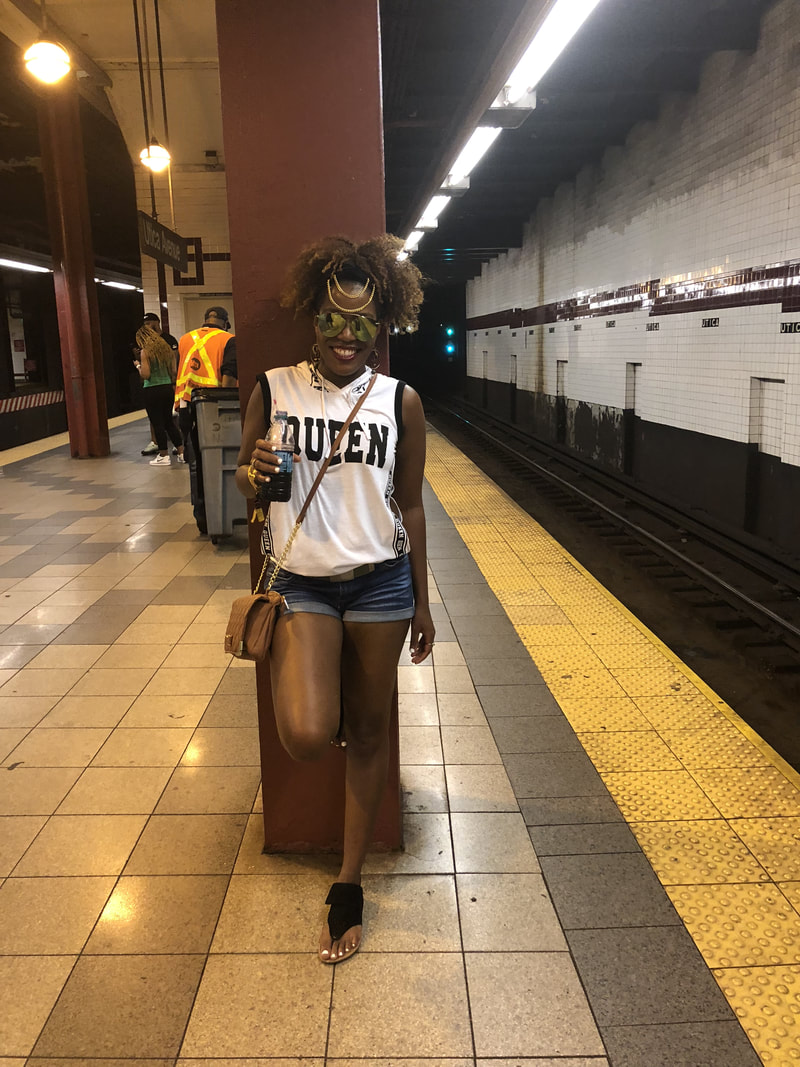 Jennifer D. Laws at Utica train station in Brooklyn headed to AfroPunk on August 26, 2018